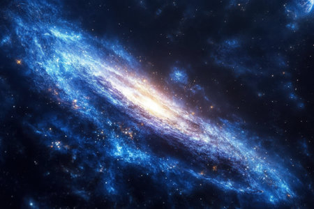 An expansive view of a spiral galaxy glowing with bright stars and cosmic dust against the dark void of space.の写真素材