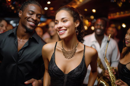 Lively dance party in a club atmosphere with friends enjoying music and celebrating together at night.の写真素材