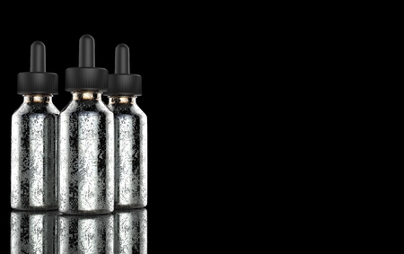 E cigarettes Liquid Bottle on black background. Vape.の写真素材