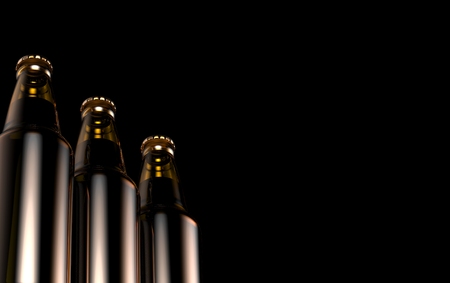 Close up bottles of beer on a black background.の写真素材