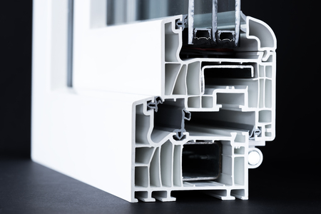 cut of pvc window profile closeup, triple glazing, black backgroundの写真素材