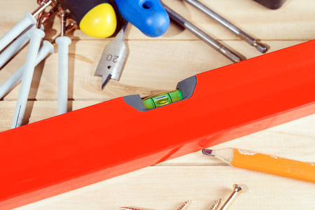 Carpenter tools on wooden backgroundの写真素材