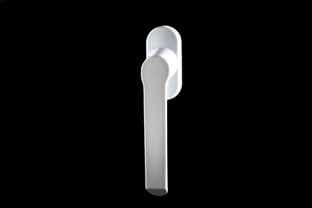 white window handle isolated on black backgroundの写真素材
