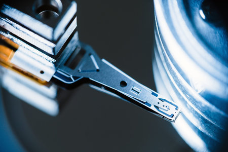 closeup inside the hard drive, read write head.