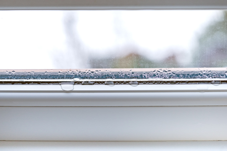Condensation on glass closeup pvc windows double glazingの写真素材