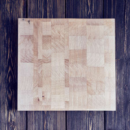 Chopping board on textured backgroundの写真素材