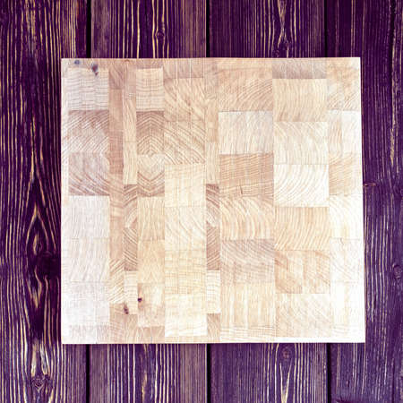 Chopping board on textured backgroundの写真素材