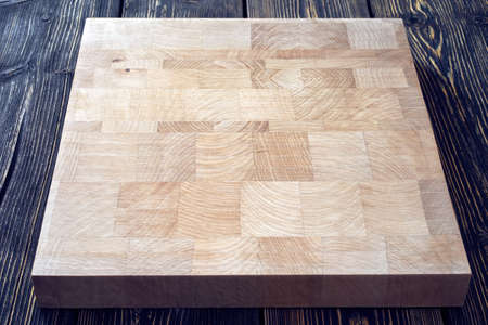 Chopping board on textured backgroundの写真素材