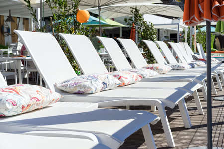 terrace with daybed and umbrellasの写真素材