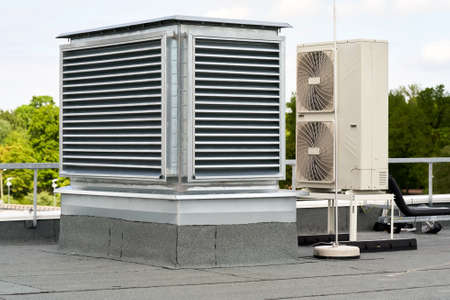 The external units air conditioning and ventilation systems installed on the flat roofの写真素材