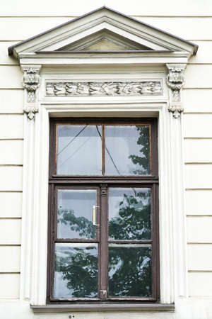 old wooden window old stone house decorative elements architectural monumentの写真素材