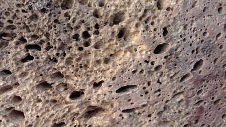 Background of stone texture. Close-up of a stone wall.の写真素材