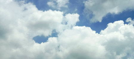 Blue sky background with tiny clouds. Panoramic image of blue sky with tiny clouds.の写真素材