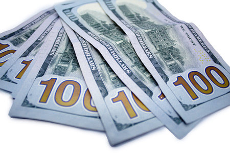 100 dollar banknotes isolated on a white background. Close up.