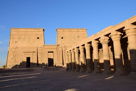 Ancient pharaohs Philae temple in Aswan Egypt in the river nile , old temple have hieroglyphs craved in its stones/Trajan's Kiosk / obelisk , Ancient Egyptのeditorial素材