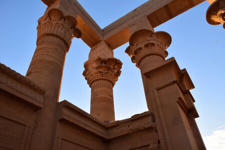 Ancient pharaohs Philae temple in Aswan Egypt in the river nile , old temple have hieroglyphs craved in its stones/Trajan's Kiosk / obelisk , Ancient Egyptのeditorial素材