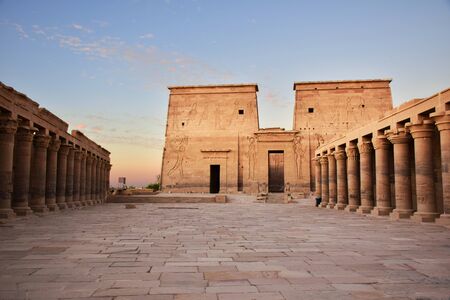 Ancient pharaohs Philae temple in Aswan Egypt in the river nile , old temple have hieroglyphs craved in its stones/Trajan's Kiosk / obelisk , Ancient Egyptのeditorial素材