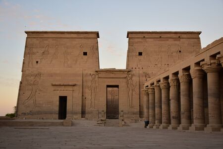 Ancient pharaohs Philae temple in Aswan Egypt in the river nile , old temple have hieroglyphs craved in its stones/Trajan's Kiosk / obelisk , Ancient Egyptのeditorial素材