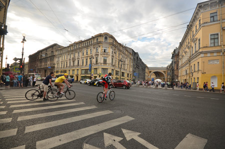 Cyclists cross the street in St. Petersburg.