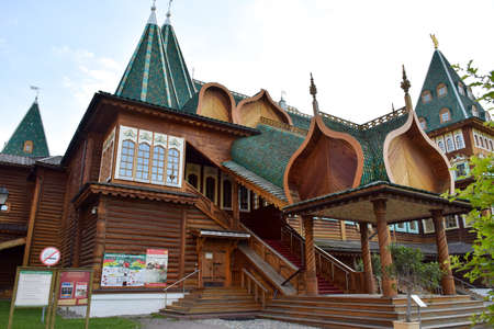 Wooden Palace Of Moscow Kolomenskoye - colorful Tourism landmark attractions in Russia - royal old palace with golden cyan brown green white colors made out of woodのeditorial素材