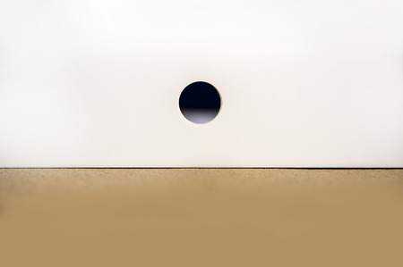 Close up to a hole on a wallの写真素材