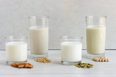 Various vega non dairy milk from nuts, seeds, cereals and legumes. Dairy free milk substitute drink,...