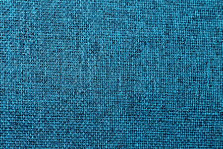 Blue linen canvas. Background of azure cloth thread texture. Fabric with natural texture. Large seamless texture, close upの写真素材