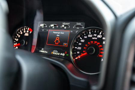 The modern sports car interior dashboard details. Close up. Speedometr. Selective focus.