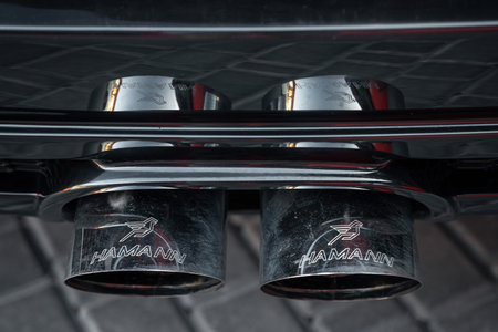 Ukraine, Odessa July 8 - 2021: Close up of car exhaust pipe modified by Hamann. Exhaust pipe of a luxury carのeditorial素材