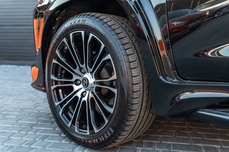 Ukraine, Odessa July 8 - 2021: Wheel with Good Year tire of a new modern Lexus LX 450 crossover car....