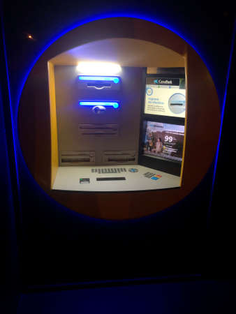 Caixabank ATM at nightのeditorial素材