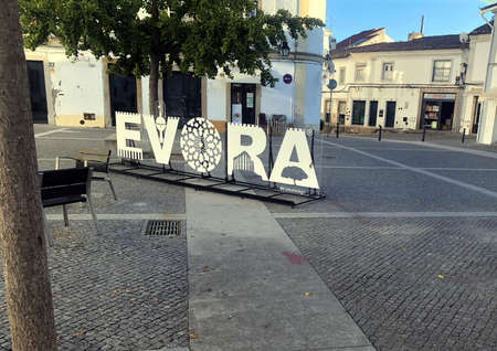 Tourist lettering in the old medieval town of Evora in Portugalの写真素材