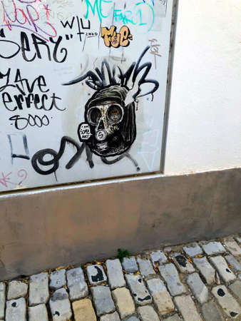 Street art, graffiti on a wall in the center of Setubal, Portugalのeditorial素材
