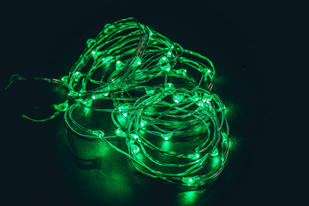 Green led wire garland, with black background