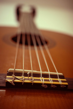 Close-up of Guitar spain Strings and Bridge Detail