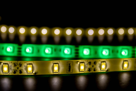 Close-up of LED strips glowing in the darkの写真素材