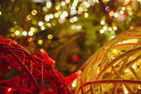 Christmas lights and festive decorations with warm bokeh backgroundの写真素材