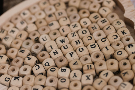 Wooden alphabet beads for early literacy activitiesの写真素材