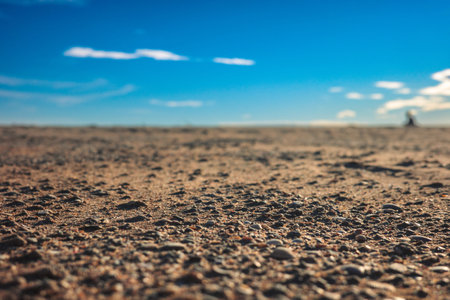 Minimal sandy beach landscape with blue sky and copy spaceの写真素材