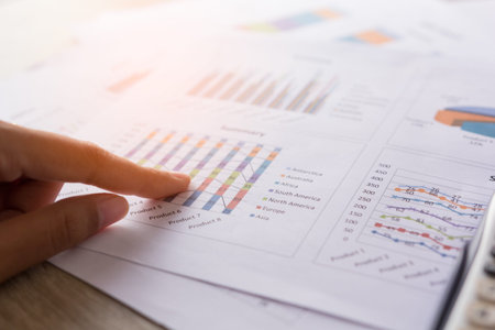 Businesswomen working with graph data at office,Finance managers task,Concept business and finance