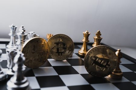 Digital money Concept. Bitcoin on chess board game of business ideas and blank space.の写真素材