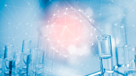 Dropping chemical liquid to test tube, laboratory research and development concept. scientist sample chemistry or medicine testの写真素材