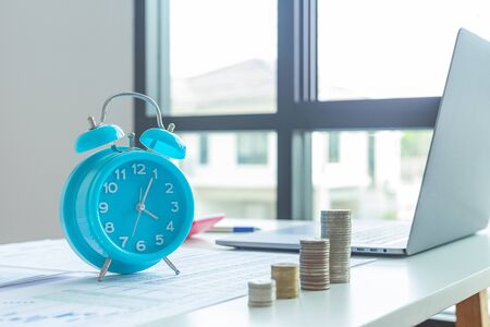 Time of saveing value money : business ideas and competition and strategy plan with clock background, Idea of value to finance and saving money.の写真素材
