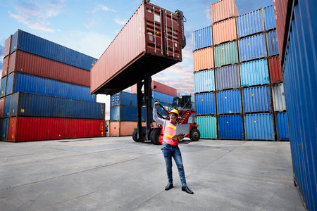 Business man raised fist air corporate celebration victory of deal export product with background of...