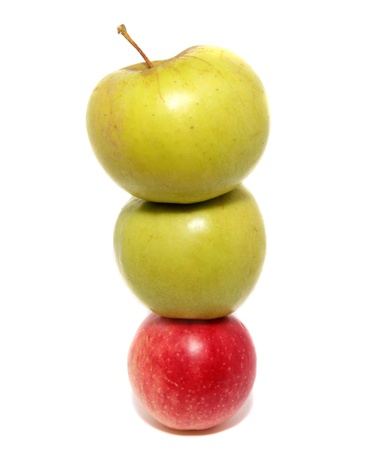 Pyramid from one red apple - bases and two greenの写真素材