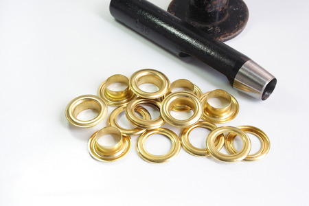 Brass eyelet and eyelet toolの写真素材