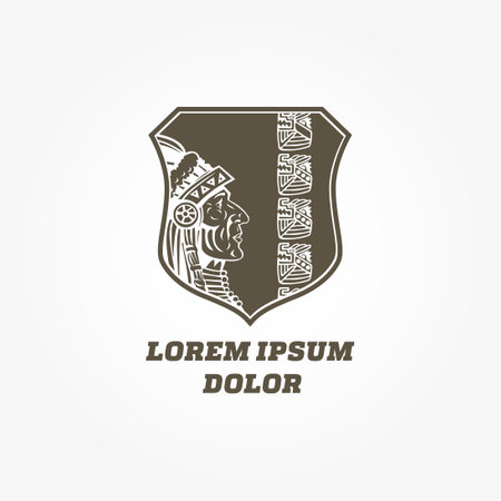 Lion head in a helmet and shield vector logo design template.のイラスト素材
