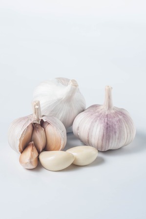 Food fresh garlic isolated on white backgroundの写真素材