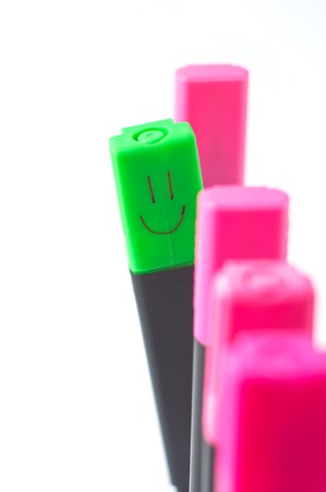 marker with a smile differs from others in the same row. isolatedの写真素材