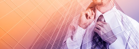 Double exposure concept with thinking businessman adjusting his tie.の写真素材